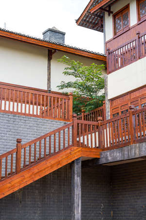 Chinese traditional retro wooden house buildings, turretsのeditorial素材