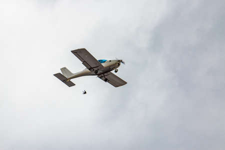 A small plane flies in the sky