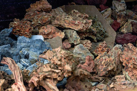 A pile of porous alluvial rocks close-up