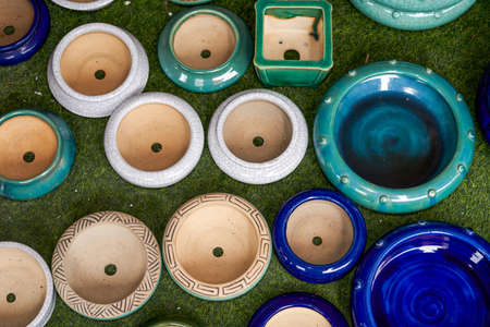 Close-up of a water basin in colorful glazed ceramicsの写真素材