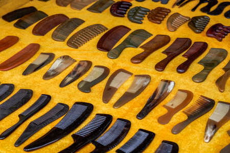 Rows of Chinese wooden combs in a storeの写真素材