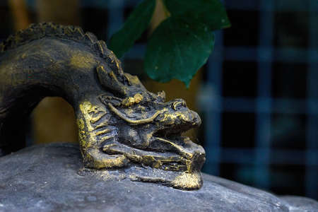 Close-up of a brass faucet sculpture handleの写真素材