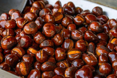 Pile of sweet candied fried chestnuts close-upの写真素材