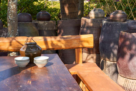 Wooden dining table and stools in traditional Chinese villageの写真素材