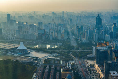 Cityscape of evening sunset in Nanning, Guangxi, China, viewed from aboveのeditorial素材