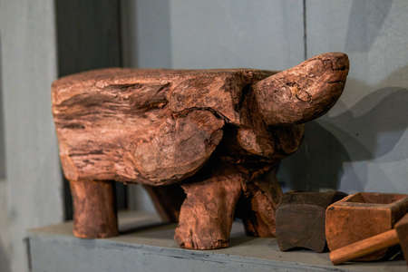 Close-up of a wooden carving in the shape of a turtleの写真素材