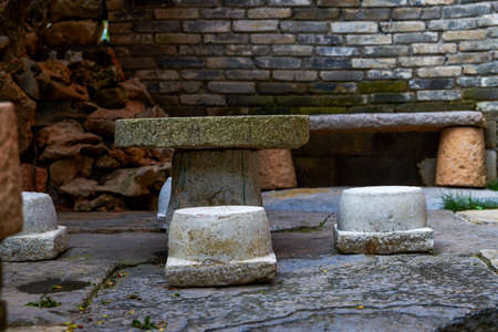 Close up of stone round table and stools in Chinese gardenの写真素材
