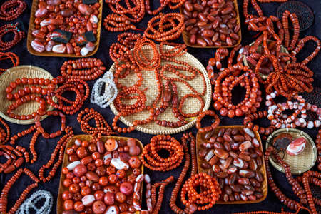 Colorful gemstone necklaces and pendants for sale in the marketの写真素材