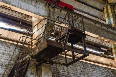 Close-up of rotor equipment in an old factory building in an industrial areaの写真素材