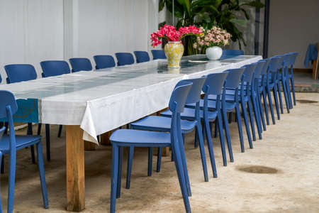 Catering long table seating and conference long table in restaurantの写真素材