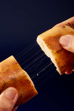 A close-up of the wire drawing effect of a lotus root after being cut