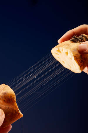 A close-up of the wire drawing effect of a lotus root after being cut