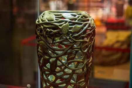 Wooden root carved vase in the museumのeditorial素材