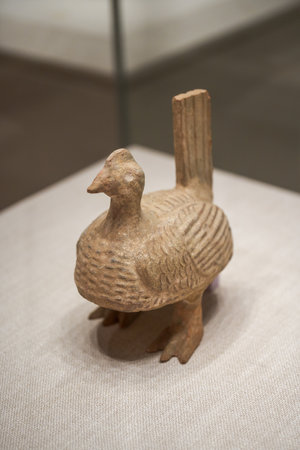 Ancient Chinese cultural relics of the Han Dynasty in the museum, clay chicken statuesのeditorial素材