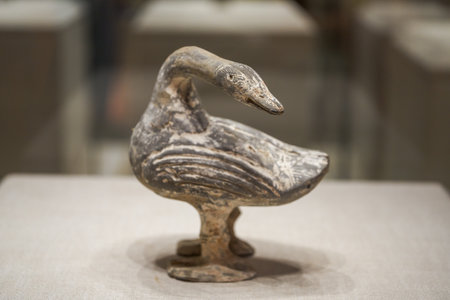 Ancient Chinese cultural relics from the Han Dynasty in the museum, clay goose statueのeditorial素材