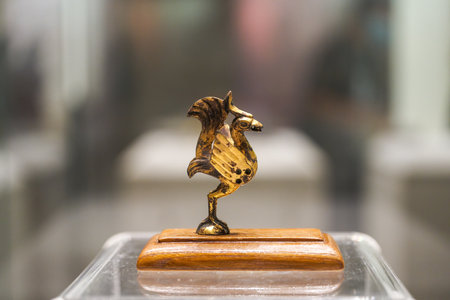 Ancient Chinese Han Dynasty artifacts in the museum, gilded rooster statue