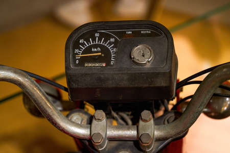 Close-up of the needles of the mechanical dashboard of an old motorcycleの写真素材