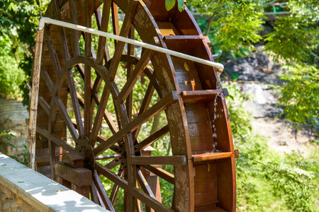 Wooden waterwheel for outdoor irrigationの写真素材