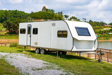 An RV parked on the lawn outdoorsの写真素材