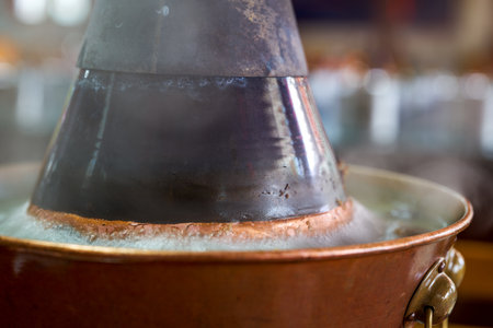 Close-up of a hot old Beijing shabu-shabu copper pot