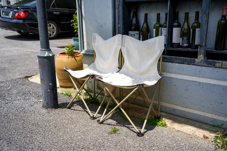 Two casual folding chairs in outdoor barの写真素材