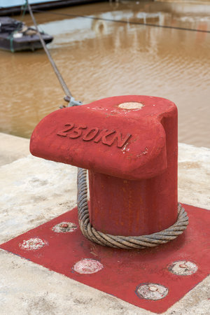 Close-up of large steel anchor on the pier