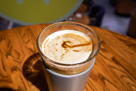 A cup of fragrant latte hot coffee closeup