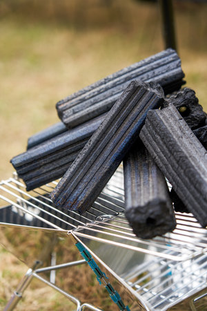 Close up of a pile of charcoal piles for camping outdoorsの写真素材