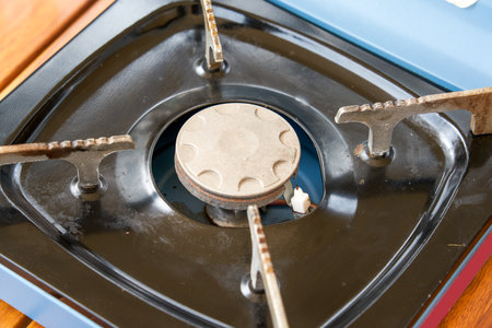 Close-up of a cassette stove burner for outdoor campingの写真素材