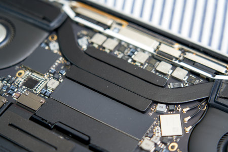 The internal structural electronic components of a disassembled high-end laptop