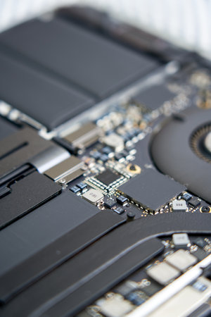 The internal structural electronic components of a disassembled high-end laptop
