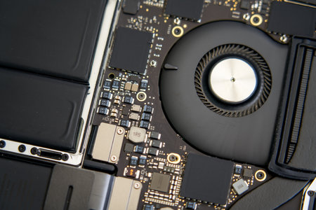 The internal structural electronic components of a disassembled high-end laptop