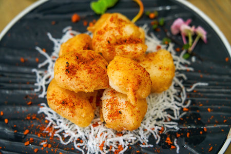 A plate of crispy and delicious fried shrimp balls
