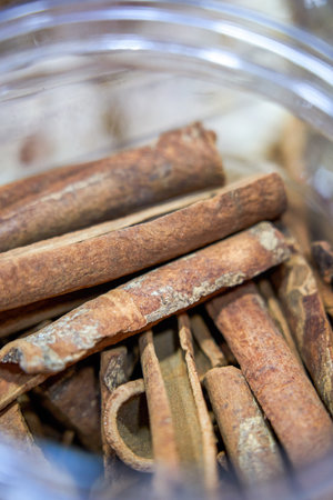Close up of whole cinnamon cassia for sale in spice shopの写真素材