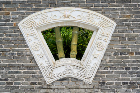 Close-up of traditional transom on the wall of ancient building during the Republic of China periodの写真素材