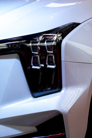 Close-up of headlights and taillights of a luxury car