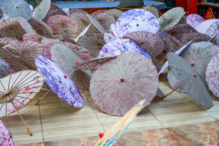 Close-up of a pile of exquisite Chinese oil-paper umbrellasの写真素材