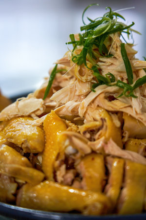 A plate of fresh and delicious white-cut chicken, hand-shredded chickenの写真素材