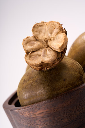 Traditional Chinese medicinal herb monk fruit, white backgroundの写真素材