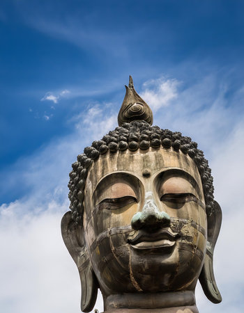 Buddha statue on blue sky background,Thailand,Asiaの素材