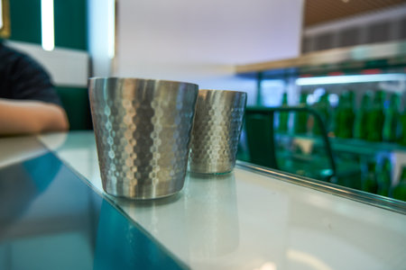 Stainless steel drinking cups provided by the tea restaurantの写真素材