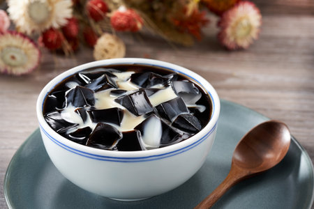 Traditional sweet soup dessert from Guangdong and Guangxi, China, Guilinggao with condensed milkの写真素材