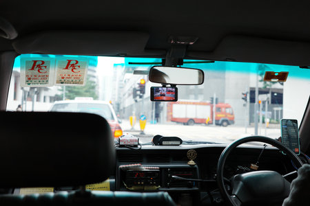 Close-up of the interior of an urban taxi in Hong Kong, Chinaの写真素材