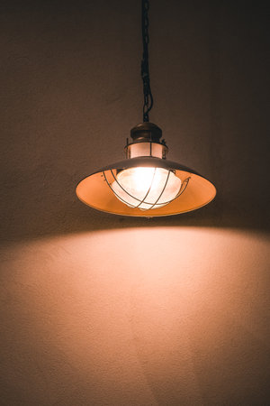 Close-up of modern glass lamps indoors