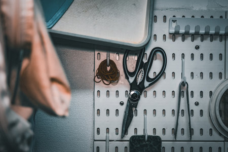 Pegboard with tools hanging on the studio wallの写真素材