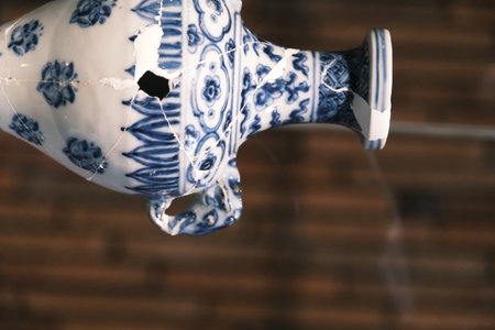 A real, broken ceramic vase on display at the Jingdezhen Museum in Jiangxi, Chinaの写真素材
