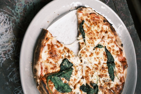 Close-up of traditional Italian cheese and meat sauce pizzaの写真素材