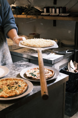Close-up of traditional meat sauce and cheese pizza
