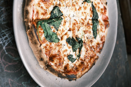 Close-up of traditional meat sauce and cheese pizzaの写真素材