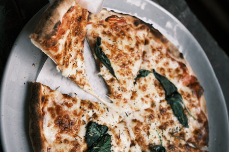 Close-up of traditional Italian meat sauce and cheese pizzaの写真素材